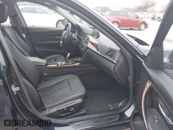 2015 BMW 3 Series 328i xDrive with VIN WBA3B3C54FJ984107, listed as a IAAI auction lot 41565829 with 98,557 mi miles and . Bid and sale history available at DreamBid. Image 5.