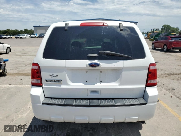 2012 Ford Escape XLS with VIN 1FMCU0C70CKC47257, listed as a Copart auction lot 61061255 with Not provided miles and Salvage title. Bid and sale history available at DreamBid. Image 6.