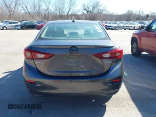 2017 Mazda 3 Grand Touring z VIN 3MZBN1W39HM137879, wystawiony jako IAAI lot #41857308 z przebiegiem 73 569 mil mil oraz . Historia ofert i sprzedaży dostępna na DreamBid. Obrazek 16.