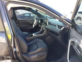 2021 Toyota RAV4 Prime XSE with VIN JTMFB3FV7MD009740, listed as a IAAI auction lot 41666510 with 59,950 mi miles. Bid and sale history available at carsss.com. Image 5.