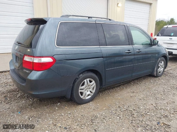 2005 Honda Odyssey EX-L with VIN 5FNRL38745B047221, listed as a IAAI auction lot 41732407 with 275,604 mi miles. Bid and sale history available at carsss.com. Image 4.