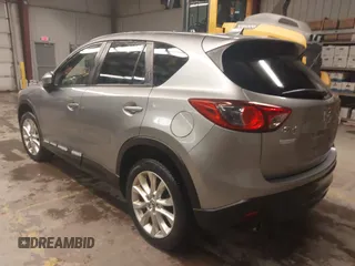 2014 Mazda CX-5 Grand Touring with VIN JM3KE4DY5E0305882, listed as a IAAI auction lot 41879532 with 173,443 mi miles. Bid and sale history available at carsss.com. Image 3.