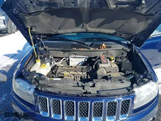 2014 Jeep Compass Sport with VIN 1C4NJCBA2ED594035, listed as a IAAI auction lot 41282961 with 118,606 mi miles. Bid and sale history available at carsss.com. Image 10.