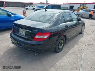 2009 Mercedes-Benz C-Class 3.0L Sport with VIN WDDGF81X59R057137, listed as a IAAI auction lot 41929478 with 157,153 mi miles. Bid and sale history available at carsss.com. Image 4.
