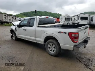 2021 Ford F-150 XL with VIN 1FTFX1E51MFC05216, listed as a Copart auction lot 56571785 with 94,584 mi miles and Salvage title. Bid and sale history available at DreamBid. Image 2.