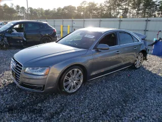 2015 Audi A8 z VIN WAUJGAFD9FN022023, wystawiony jako Copart lot #86048354 z przebiegiem Nie podano mil oraz Szkoda całkowita • Salvage title. Historia ofert i sprzedaży dostępna na DreamBid. Obrazek 1.