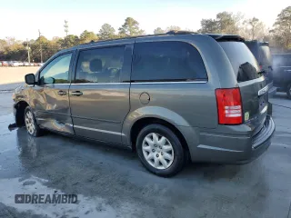 2010 Chrysler Town & Country LX with VIN 2A4RR4DE3AR344191, listed as a Copart auction lot 41399625 with 163,934 mi miles and Salvage Title. Bid and sale history available at DreamBid. Image 2.