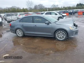 2015 Volkswagen Jetta Sedan 1.8T SE w/Connectivity with VIN 3VWD07AJ8FM260537, listed as a IAAI auction lot 41730338 with 155,724 mi miles. Bid and sale history available at carsss.com. Image 13.