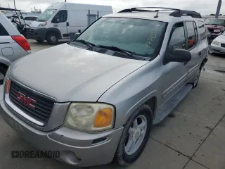 2005 GMC Envoy SLT with VIN 1GKET16S656102004, listed as a Copart auction lot 74543124 with Not Provided miles and Salvage Title. Bid and sale history available at DreamBid. Image 1.