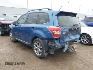 2015 Subaru Forester 2.5i Touring with VIN JF2SJAUC6FH440333, listed as a IAAI auction lot 41414701 with 115,223 mi miles. Bid and sale history available at carsss.com. Image 3.