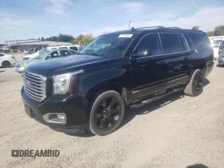 2020 GMC Yukon XL SLT with VIN 1GKS1GKC9LR186504, listed as a Copart auction lot 77565634 with 20,074 mi miles and Salvage Title. Bid and sale history available at carsss.com. Image 1.