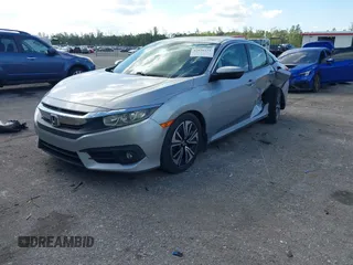 2017 Honda Civic EX-T with VIN 19XFC1F39HE001756, listed as a IAAI auction lot 42030331 with 44,056 mi miles. Bid and sale history available at carsss.com. Image 2.
