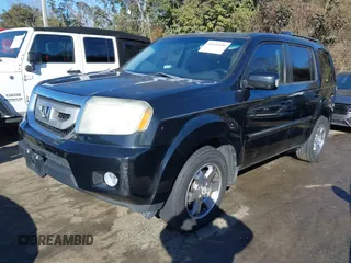 2010 Honda Pilot Touring with VIN 5FNYF4H95AB030531, listed as a IAAI auction lot 41441088 with 274,185 mi miles and . Bid and sale history available at carsss.com. Image 17.