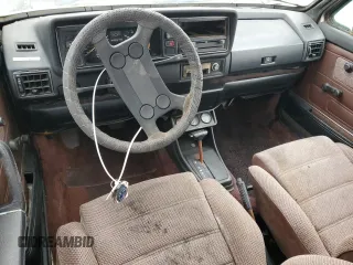 1984 Volkswagen Rabbit z VIN WVWCA0152EK015292, wystawiony jako Copart lot #55503315 z przebiegiem 216 970 mil mil oraz Tytuł czysty. Historia ofert i sprzedaży dostępna na DreamBid. Obrazek 8.