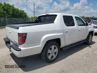 2012 Honda Ridgeline RTL with VIN 5FPYK1F56CB002709, listed as a Copart auction lot 62642495 with 116,416 mi miles and Salvage title. Bid and sale history available at DreamBid. Image 3.