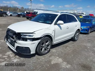 2016 Audi Q3 Prestige with VIN WA1GFCFS9GR022778, listed as a IAAI auction lot 41986610 with 14,508 mi miles. Bid and sale history available at carsss.com. Image 2.