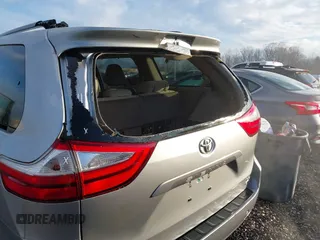 2017 Toyota Sienna LE with VIN 5TDJZ3DC6HS184126, listed as a IAAI auction lot 41166135 with 101,305 mi miles. Bid and sale history available at carsss.com. Image 6.