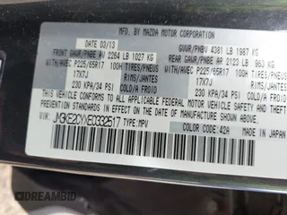 2014 Mazda CX-5 Touring with VIN JM3KE2CYXE0332517, listed as a IAAI auction lot 42109592 with 138,214 mi miles. Bid and sale history available at carsss.com. Image 9.