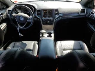 2014 Jeep Grand Cherokee Limited with VIN 1C4RJFBG2EC121152, listed as a Copart auction lot 68676144 with 145,891 mi miles and Salvage title. Bid and sale history available at DreamBid. Image 8.