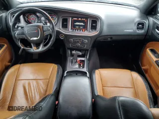 2019 Dodge Charger SXT with VIN 2C3CDXJG9KH523879, listed as a Copart auction lot 82988364 with 71,386 mi miles and Salvage Title. Bid and sale history available at DreamBid. Image 8.