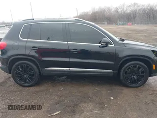 2012 Volkswagen Tiguan SE with VIN WVGAV7AX0CW602713, listed as a IAAI auction lot 41558520 with 95,678 mi miles and . Bid and sale history available at DreamBid. Image 13.