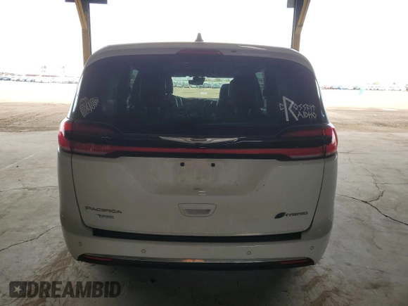 2022 Chrysler Pacifica Hybrid Limited with VIN 2C4RC1S74NR123134, listed as a Copart auction lot 57906795 with 75,648 mi miles and Salvage title. Bid and sale history available at DreamBid. Image 6.