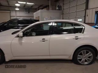 2013 Infiniti G37 x with VIN JN1CV6AR6DM751636, listed as a IAAI auction lot 41129545 with 125,487 mi miles and . Bid and sale history available at carsss.com. Image 14.
