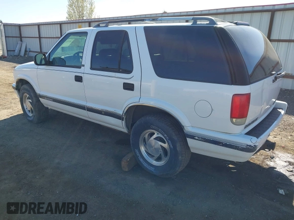 1995 Chevrolet Blazer z VIN 1GNDT13W0S2140739, wystawiony jako IAAI lot #42064301 z przebiegiem 128 901 mil mil oraz . Historia ofert i sprzedaży dostępna na DreamBid. Obrazek 3.