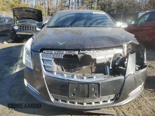 2013 Cadillac XTS Platinum z VIN 2G61V5S3XD9100843, wystawiony jako Copart lot #42943555 z przebiegiem 122 153 mil mil oraz Szkody całkowita. Historia ofert i sprzedaży dostępna na DreamBid. Obrazek 5.