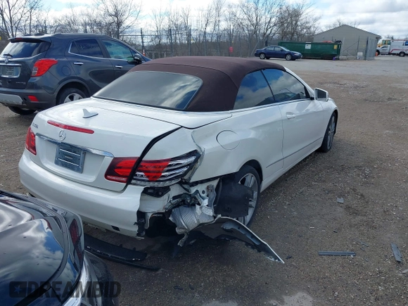 2014 Mercedes-Benz E-Class E 350 with VIN WDDKK5KF9EF241907, listed as a IAAI auction lot 42016399 with 84,650 mi miles. Bid and sale history available at carsss.com. Image 4.
