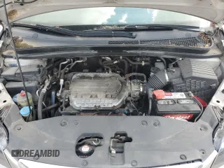2007 Honda Odyssey LX z VIN 5FNRL382X7B084104, wystawiony jako Copart lot #57399625 z przebiegiem 213 134 mil mil oraz Szkoda całkowita • Salvage title. Historia ofert i sprzedaży dostępna na DreamBid. Obrazek 12.