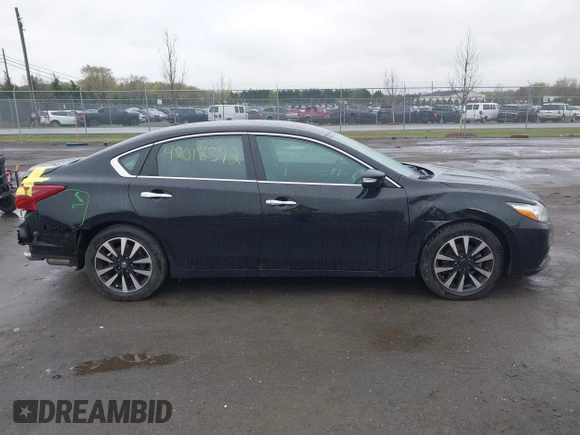 2018 Nissan Altima SR with VIN 1N4AL3AP9JC139011, listed as a IAAI auction lot 42018392 with 163,674 mi miles and . Bid and sale history available at carsss.com. Image 14.