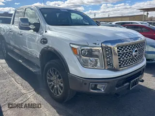 2016 Nissan Titan XD PRO-4X with VIN 1N6BA1F40GN515810, listed as a Copart auction lot 87436204 with 210,650 mi miles and Clean Title. Bid and sale history available at carsss.com. Image 1.