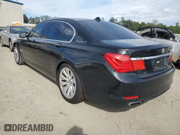 2011 BMW 7 Series with VIN WBAKX8C52BC198377, listed as a Copart auction lot 70003444 with 173,725 mi miles and Salvage title. Bid and sale history available at DreamBid. Image 2.