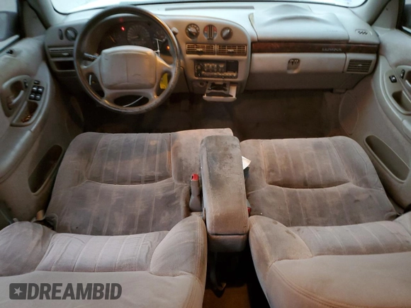 1997 Chevrolet Lumina LS with VIN 2G1WL52M5V9107095, listed as a Copart auction lot 73659954 with 135,669 mi miles and Salvage Title. Bid and sale history available at DreamBid. Image 8.