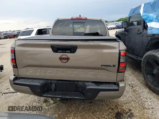 2024 Nissan Frontier SL with VIN 1N6ED1EJ4RN657334, listed as a Copart auction lot 55169675 with 5,706 mi miles and Salvage title. Bid and sale history available at DreamBid. Image 6.