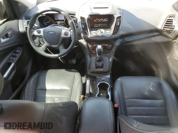 2015 Ford Escape Titanium with VIN 1FMCU0J97FUC80446, listed as a Copart auction lot 58749895 with 106,890 mi miles and Salvage title. Bid and sale history available at DreamBid. Image 8.