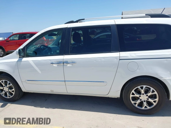 2014 Kia Sedona EX with VIN KNDMH4C76E6554982, listed as a IAAI auction lot 41980362 with 164,380 mi miles and . Bid and sale history available at DreamBid. Image 14.