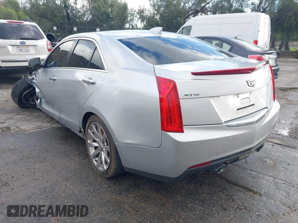 2018 Cadillac ATS Luxury RWD z VIN 1G6AB5RX6J0110860, wystawiony jako IAAI lot #41556662 z przebiegiem 63 886 mil mil oraz . Historia ofert i sprzedaży dostępna na DreamBid. Obrazek 3.