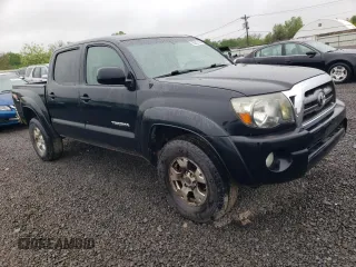 2009 Toyota Tacoma with VIN 5TELU42N09Z616926, listed as a Copart auction lot 55262155 with 252,219 mi miles and Clean Title. Bid and sale history available at DreamBid. Image 4.