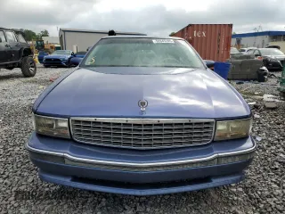 1995 Cadillac DeVille z VIN 1G6KD52B3SU243924, wystawiony jako Copart lot #56945395 z przebiegiem 72 878 mil mil oraz Szkoda całkowita • Salvage title. Historia ofert i sprzedaży dostępna na DreamBid. Obrazek 5.