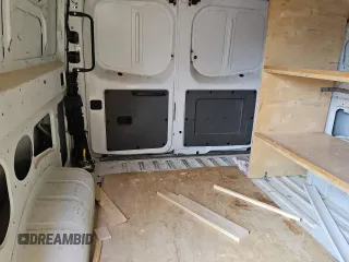 2017 Nissan NV Cargo S z VIN 1N6BF0KM2HN803511, wystawiony jako Copart lot #86592964 z przebiegiem 120 174 mil mil oraz Czysty tytuł • Clean title. Historia ofert i sprzedaży dostępna na DreamBid. Obrazek 10.