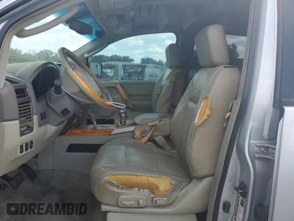 2004 Infiniti QX56 with VIN 5N3AA08C24N804778, listed as a Copart auction lot 53715775 with 183,725 mi miles and Salvage Title. Bid and sale history available at DreamBid. Image 7.
