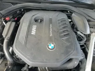 2019 BMW 7 Series 740i xDrive with VIN WBA7E4C55KGV70002, listed as a Copart auction lot 66395815 with 128,606 mi miles and Salvage title. Bid and sale history available at DreamBid. Image 13.