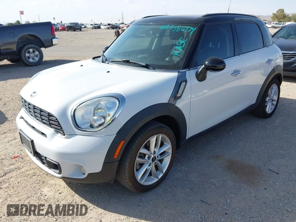2014 MINI Countryman S z VIN WMWZC3C57EWP51864, wystawiony jako IAAI lot #42556774 z przebiegiem 73 912 mil mil oraz . Historia ofert i sprzedaży dostępna na DreamBid. Obrazek 2.
