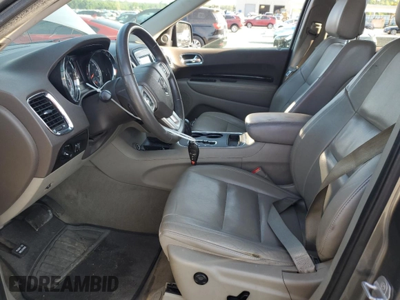 2013 Dodge Durango Crew with VIN 1C4RDHDG3DC596985, listed as a Copart auction lot 62218015 with 296,266 mi miles and Salvage title. Bid and sale history available at DreamBid. Image 7.