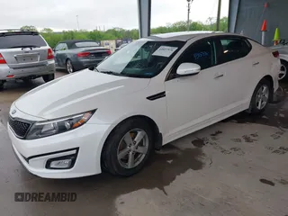 2015 Kia Optima LX with VIN KNAGM4A74F5599130, listed as a IAAI auction lot 42037576 with 177,067 mi miles. Bid and sale history available at carsss.com. Image 2.