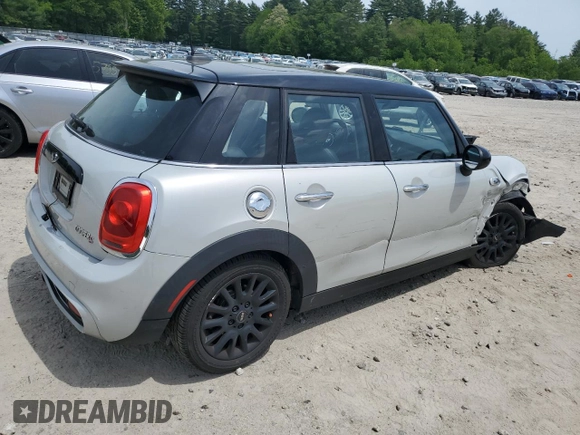 2015 MINI Hardtop 4 Door S with VIN WMWXU3C5XF2B56555, listed as a Copart auction lot 58775215 with 101,426 mi miles and Clean title. Bid and sale history available at DreamBid. Image 3.