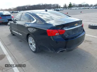 2014 Chevrolet Impala LTZ with VIN 1G1155S30EU123476, listed as a IAAI auction lot 41878992 with 116,090 mi miles and . Bid and sale history available at DreamBid. Image 3.