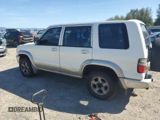 2000 Isuzu Trooper S z VIN JACDJ58X9Y7J09376, wystawiony jako Copart lot #69318184 z przebiegiem 219 355 mil mil oraz Szkody całkowita. Historia ofert i sprzedaży dostępna na DreamBid. Obrazek 2.